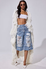 BURRR IT'S COLD OUTSIDE FRINGE OVERSIZED SWEATER IN IVORY